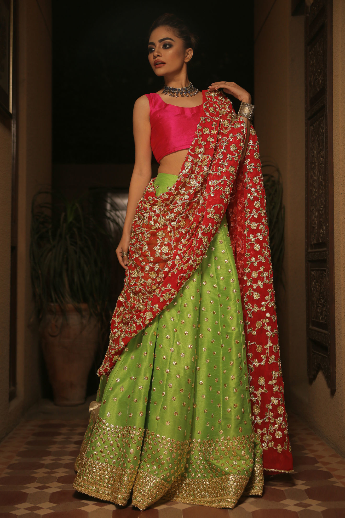 Purnaa in a green and pink combination half saree for 